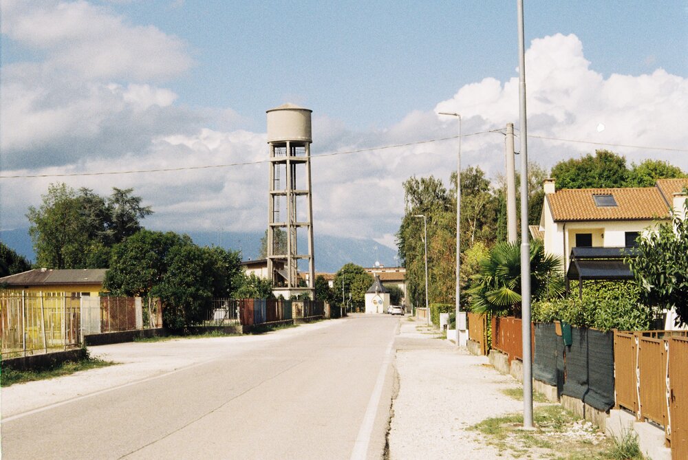 A street in my hometown with a decommissioned water tank.