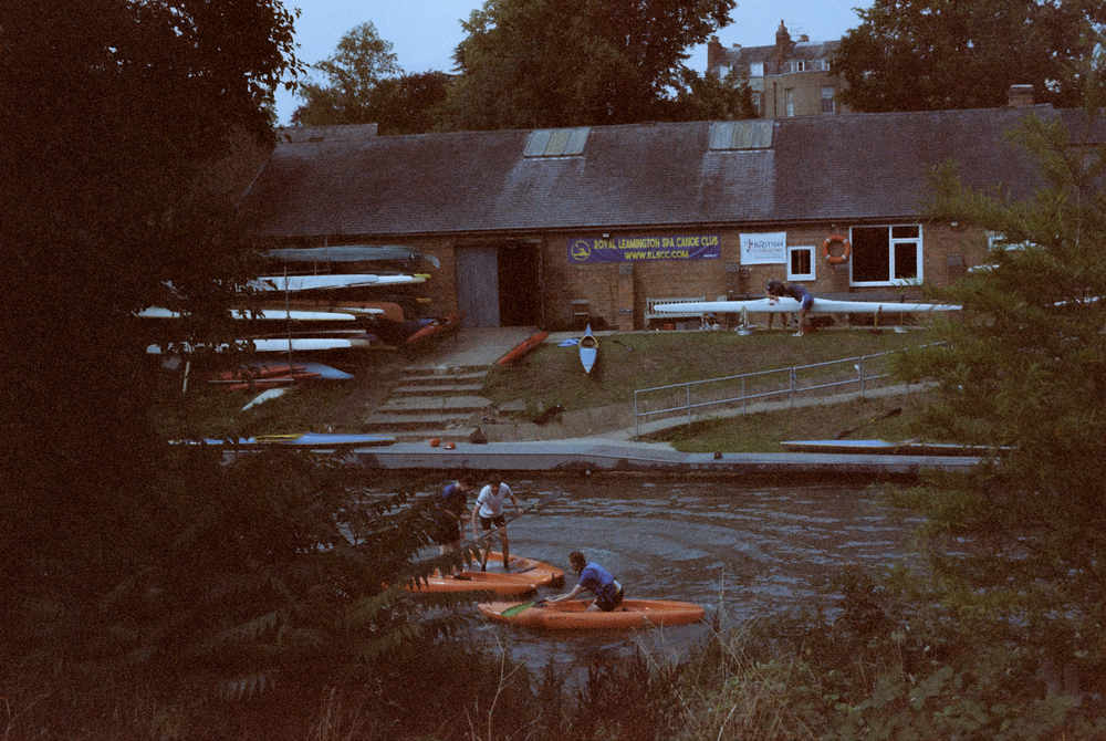 Kids on canoes.